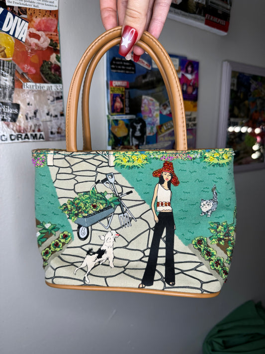 french girl + dog in a garden